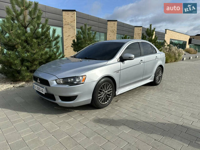 Серый Мицубиси Лансер, объемом двигателя 2 л и пробегом 189 тыс. км за 7900 $, фото 16 на Automoto.ua