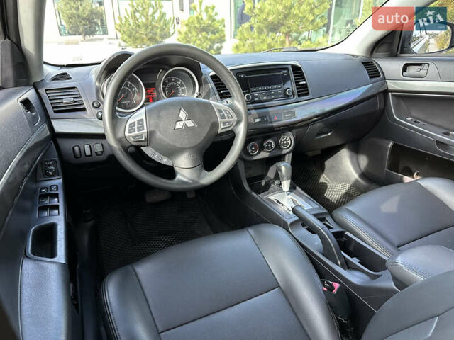 Серый Мицубиси Лансер, объемом двигателя 2 л и пробегом 189 тыс. км за 7900 $, фото 10 на Automoto.ua
