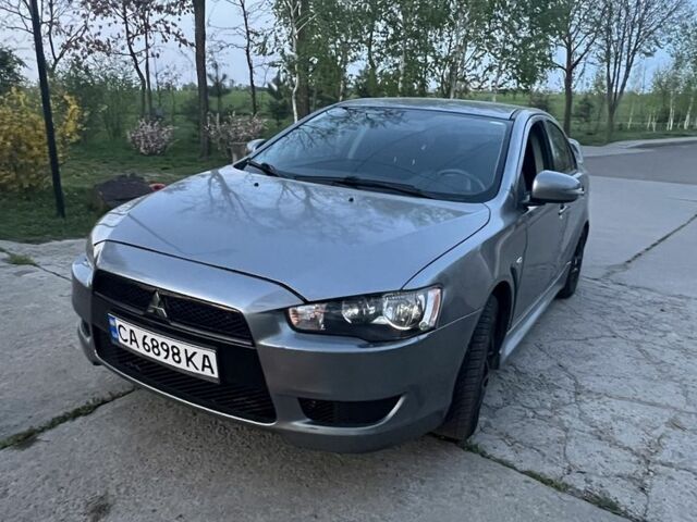 Сірий Міцубісі Lancer, об'ємом двигуна 2 л та пробігом 127 тис. км за 8500 $, фото 5 на Automoto.ua