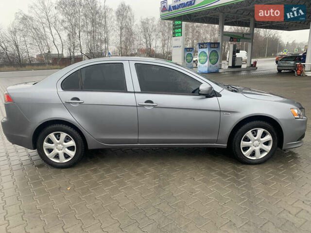 Серый Мицубиси Лансер, объемом двигателя 1.59 л и пробегом 83 тыс. км за 9900 $, фото 8 на Automoto.ua