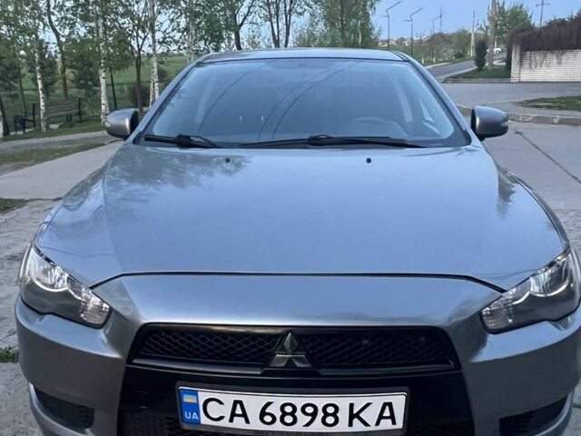 Сірий Міцубісі Lancer, об'ємом двигуна 2 л та пробігом 127 тис. км за 8500 $, фото 1 на Automoto.ua