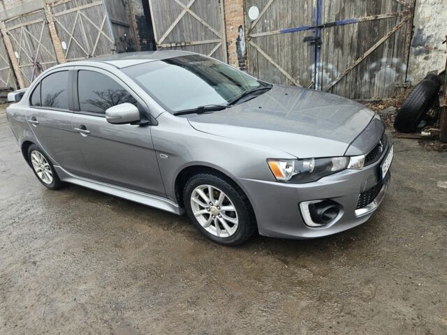 Серый Мицубиси Лансер, объемом двигателя 2 л и пробегом 250 тыс. км за 8500 $, фото 1 на Automoto.ua