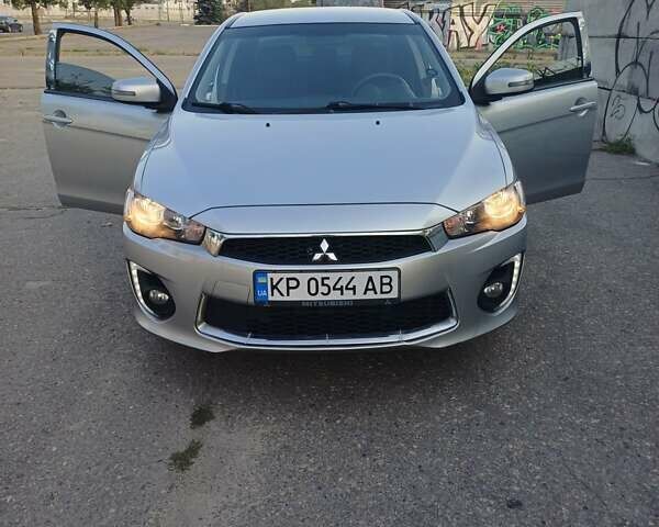 Сірий Міцубісі Lancer, об'ємом двигуна 2 л та пробігом 119 тис. км за 9900 $, фото 3 на Automoto.ua
