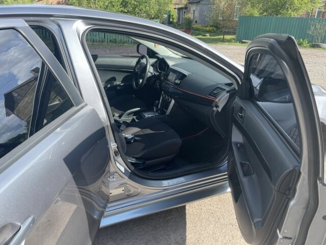 Сірий Міцубісі Lancer, об'ємом двигуна 2 л та пробігом 112 тис. км за 9700 $, фото 6 на Automoto.ua