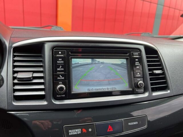 Серый Мицубиси Лансер, объемом двигателя 2 л и пробегом 170 тыс. км за 9500 $, фото 12 на Automoto.ua