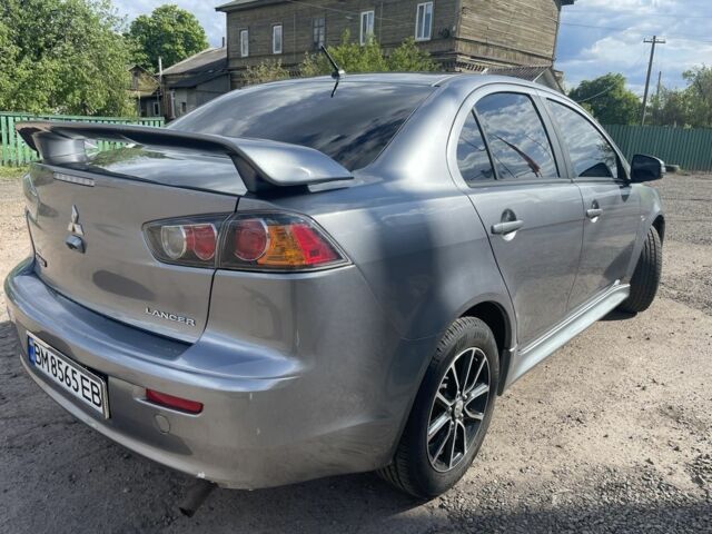 Сірий Міцубісі Lancer, об'ємом двигуна 2 л та пробігом 112 тис. км за 9700 $, фото 4 на Automoto.ua