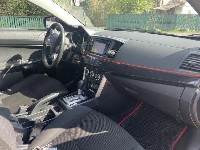 Сірий Міцубісі Lancer, об'ємом двигуна 2 л та пробігом 112 тис. км за 9700 $, фото 5 на Automoto.ua