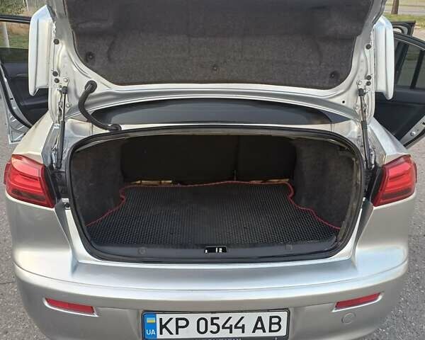 Сірий Міцубісі Lancer, об'ємом двигуна 2 л та пробігом 119 тис. км за 9900 $, фото 5 на Automoto.ua