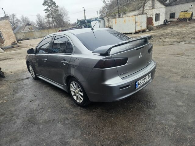 Серый Мицубиси Лансер, объемом двигателя 2 л и пробегом 250 тыс. км за 8500 $, фото 2 на Automoto.ua