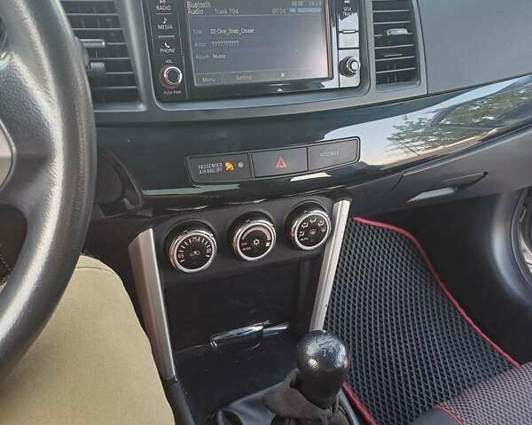 Сірий Міцубісі Lancer, об'ємом двигуна 2 л та пробігом 119 тис. км за 9900 $, фото 9 на Automoto.ua