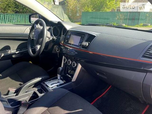 Сірий Міцубісі Lancer, об'ємом двигуна 2 л та пробігом 112 тис. км за 9700 $, фото 4 на Automoto.ua