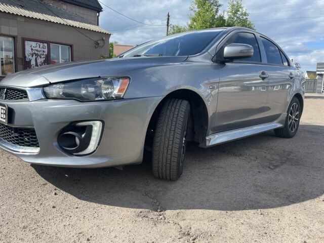 Сірий Міцубісі Lancer, об'ємом двигуна 2 л та пробігом 112 тис. км за 9700 $, фото 2 на Automoto.ua