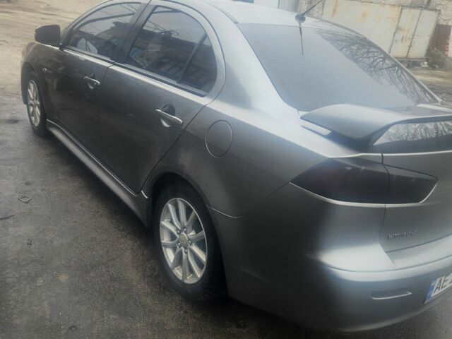 Серый Мицубиси Лансер, объемом двигателя 2 л и пробегом 250 тыс. км за 8500 $, фото 6 на Automoto.ua