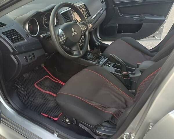 Сірий Міцубісі Lancer, об'ємом двигуна 2 л та пробігом 119 тис. км за 9900 $, фото 6 на Automoto.ua
