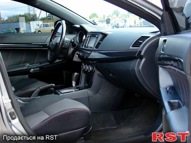 Серый Мицубиси Лансер, объемом двигателя 2 л и пробегом 85 тыс. км за 9700 $, фото 12 на Automoto.ua