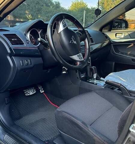 Сірий Міцубісі Lancer, об'ємом двигуна 2 л та пробігом 88 тис. км за 10000 $, фото 14 на Automoto.ua