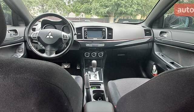 Сірий Міцубісі Lancer, об'ємом двигуна 2 л та пробігом 56 тис. км за 10500 $, фото 27 на Automoto.ua