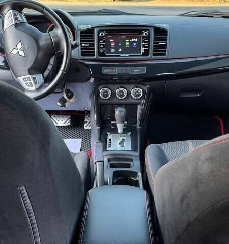 Сірий Міцубісі Lancer, об'ємом двигуна 2 л та пробігом 88 тис. км за 10000 $, фото 13 на Automoto.ua