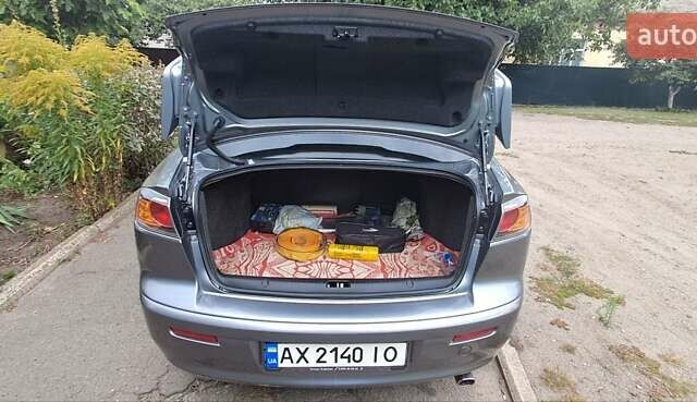 Сірий Міцубісі Lancer, об'ємом двигуна 2 л та пробігом 56 тис. км за 10500 $, фото 7 на Automoto.ua