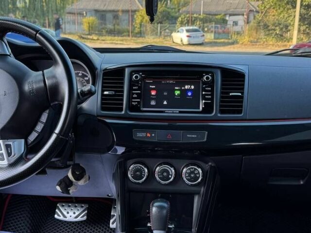 Сірий Міцубісі Lancer, об'ємом двигуна 2 л та пробігом 88 тис. км за 10000 $, фото 11 на Automoto.ua