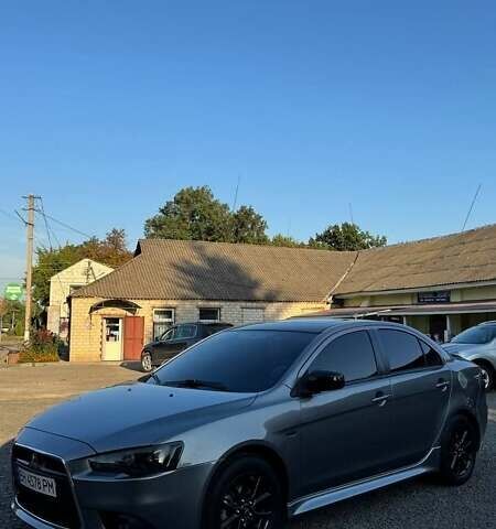 Сірий Міцубісі Lancer, об'ємом двигуна 2 л та пробігом 88 тис. км за 10000 $, фото 16 на Automoto.ua