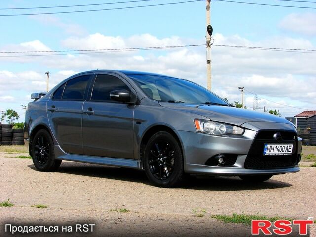 Серый Мицубиси Лансер, объемом двигателя 2 л и пробегом 85 тыс. км за 9700 $, фото 3 на Automoto.ua