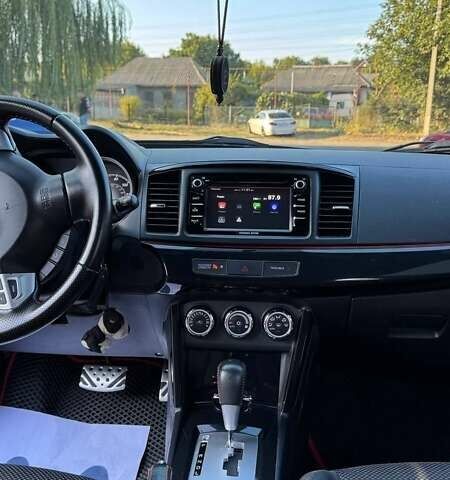 Сірий Міцубісі Lancer, об'ємом двигуна 2 л та пробігом 88 тис. км за 10000 $, фото 10 на Automoto.ua