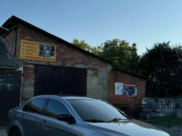 Сірий Міцубісі Lancer, об'ємом двигуна 2 л та пробігом 88 тис. км за 10000 $, фото 2 на Automoto.ua