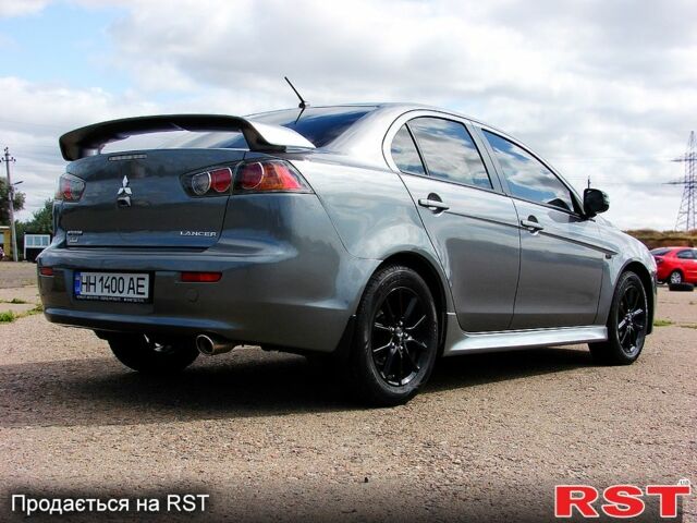 Серый Мицубиси Лансер, объемом двигателя 2 л и пробегом 85 тыс. км за 9700 $, фото 5 на Automoto.ua