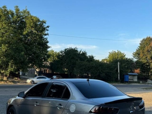 Сірий Міцубісі Lancer, об'ємом двигуна 2 л та пробігом 88 тис. км за 10000 $, фото 3 на Automoto.ua