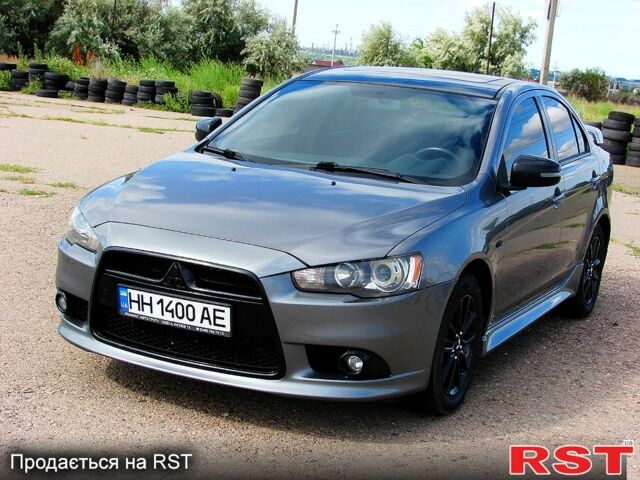 Серый Мицубиси Лансер, объемом двигателя 2 л и пробегом 85 тыс. км за 9700 $, фото 1 на Automoto.ua