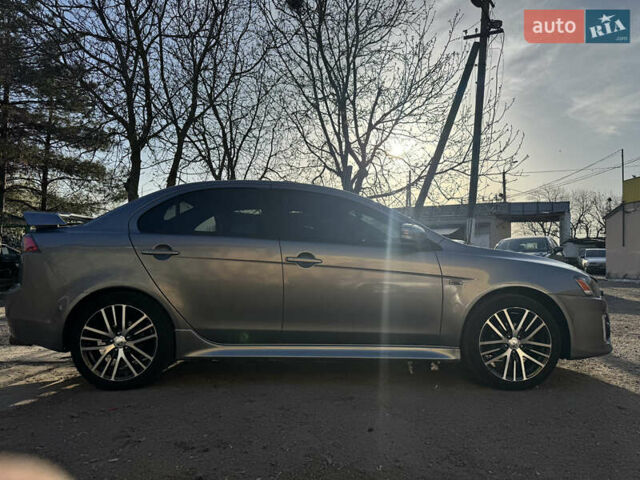 Сірий Міцубісі Lancer, об'ємом двигуна 2.36 л та пробігом 130 тис. км за 11699 $, фото 9 на Automoto.ua