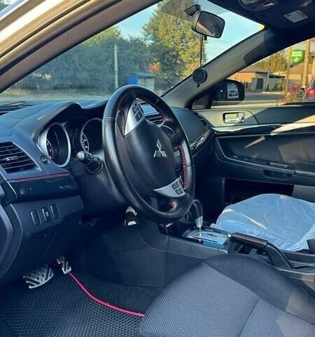 Сірий Міцубісі Lancer, об'ємом двигуна 2 л та пробігом 88 тис. км за 10000 $, фото 6 на Automoto.ua