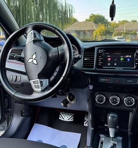 Сірий Міцубісі Lancer, об'ємом двигуна 2 л та пробігом 88 тис. км за 10000 $, фото 9 на Automoto.ua