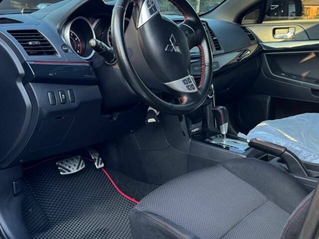 Сірий Міцубісі Lancer, об'ємом двигуна 2 л та пробігом 88 тис. км за 10000 $, фото 15 на Automoto.ua