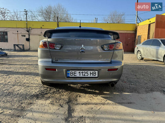 Сірий Міцубісі Lancer, об'ємом двигуна 2.36 л та пробігом 130 тис. км за 11699 $, фото 12 на Automoto.ua