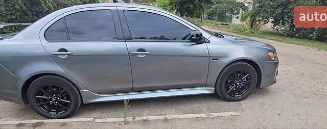 Сірий Міцубісі Lancer, об'ємом двигуна 2 л та пробігом 56 тис. км за 10500 $, фото 20 на Automoto.ua