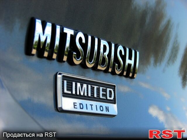 Серый Мицубиси Лансер, объемом двигателя 2 л и пробегом 85 тыс. км за 9700 $, фото 6 на Automoto.ua