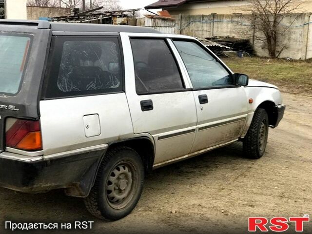 Сірий Міцубісі Lancer, об'ємом двигуна 1.5 л та пробігом 100 тис. км за 1150 $, фото 3 на Automoto.ua