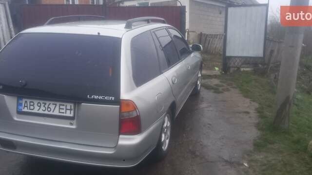 Серый Мицубиси Лансер, объемом двигателя 1.6 л и пробегом 432 тыс. км за 2200 $, фото 1 на Automoto.ua