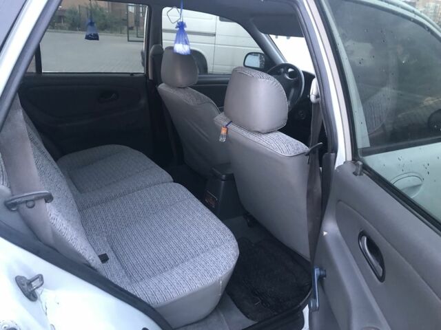 Сірий Міцубісі Lancer, об'ємом двигуна 1.6 л та пробігом 386 тис. км за 1800 $, фото 4 на Automoto.ua