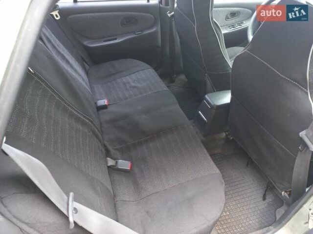 Серый Мицубиси Лансер, объемом двигателя 1.6 л и пробегом 282 тыс. км за 2401 $, фото 5 на Automoto.ua