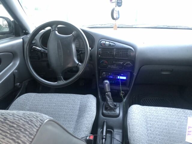 Сірий Міцубісі Lancer, об'ємом двигуна 1.6 л та пробігом 386 тис. км за 1800 $, фото 5 на Automoto.ua