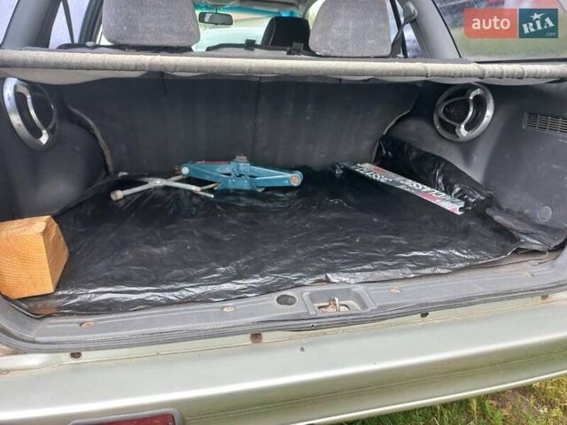 Серый Мицубиси Лансер, объемом двигателя 1.6 л и пробегом 282 тыс. км за 2401 $, фото 7 на Automoto.ua