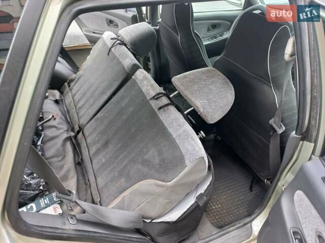 Серый Мицубиси Лансер, объемом двигателя 1.6 л и пробегом 282 тыс. км за 2401 $, фото 6 на Automoto.ua