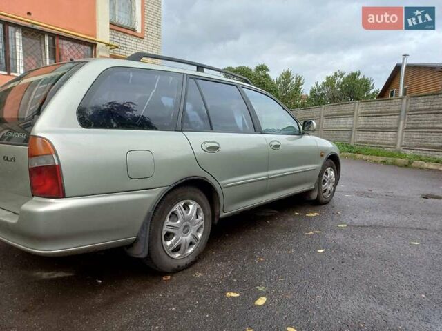 Серый Мицубиси Лансер, объемом двигателя 1.6 л и пробегом 282 тыс. км за 2401 $, фото 1 на Automoto.ua