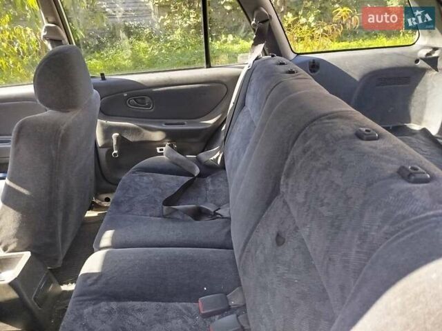 Сірий Міцубісі Lancer, об'ємом двигуна 1.6 л та пробігом 330 тис. км за 2000 $, фото 2 на Automoto.ua