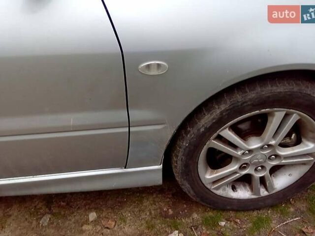 Сірий Міцубісі Lancer, об'ємом двигуна 2 л та пробігом 352 тис. км за 3950 $, фото 7 на Automoto.ua