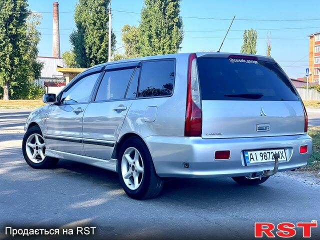 Сірий Міцубісі Lancer, об'ємом двигуна 1.6 л та пробігом 240 тис. км за 4450 $, фото 2 на Automoto.ua