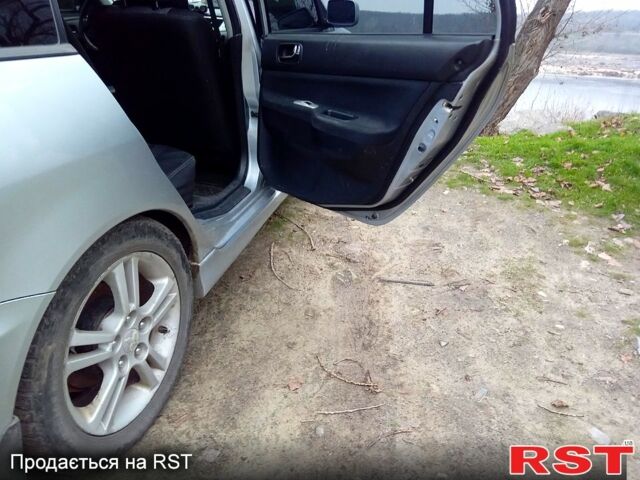 Серый Мицубиси Лансер, объемом двигателя 2 л и пробегом 352 тыс. км за 3950 $, фото 9 на Automoto.ua